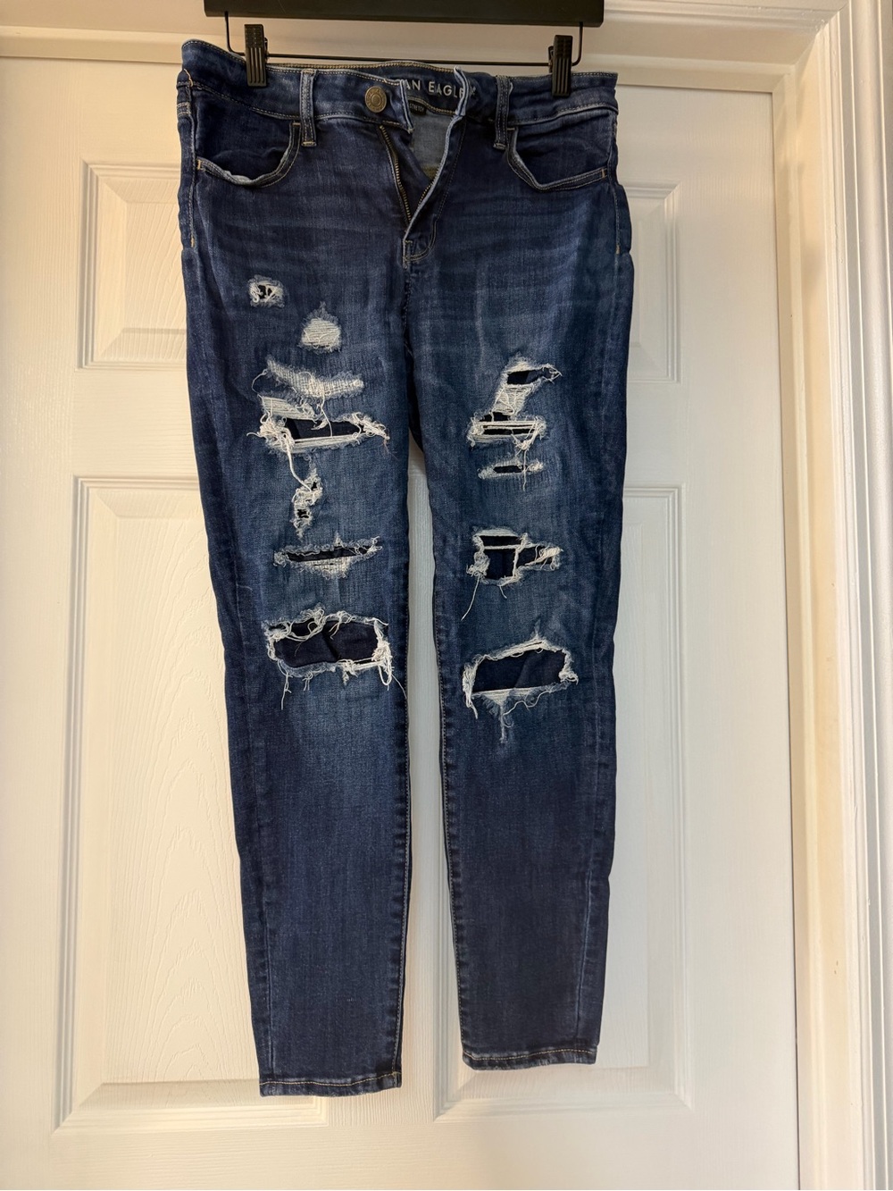 American Eagle Outfitters navy blue distressed skinny jeans